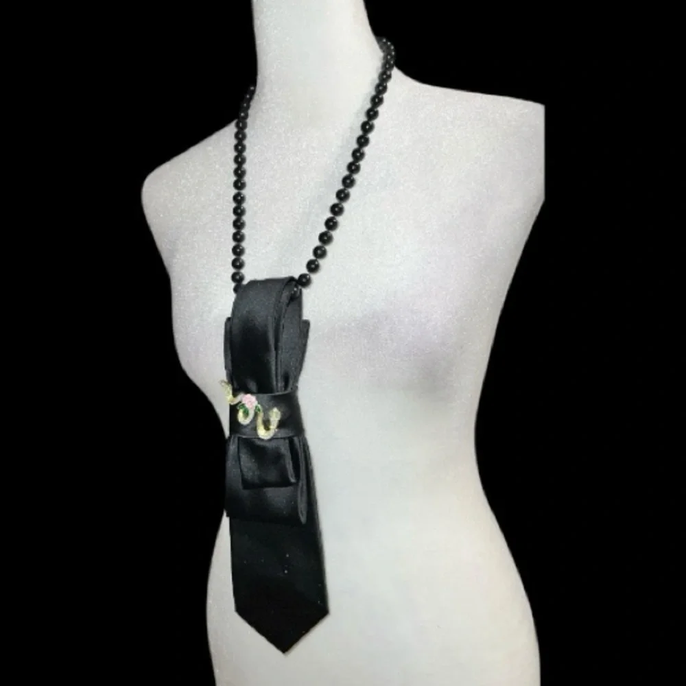“Dainty Dapper”  Black necktie Necklace with Gold and Pink Accent serpent pin.